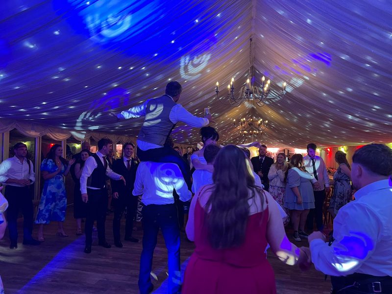 A marquee celebration beneath a starlit ceiling